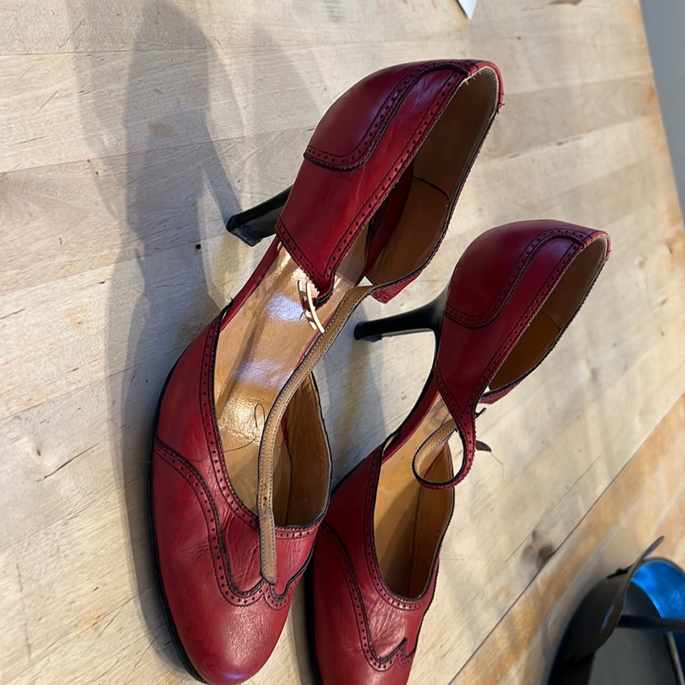 The shoes are dark red